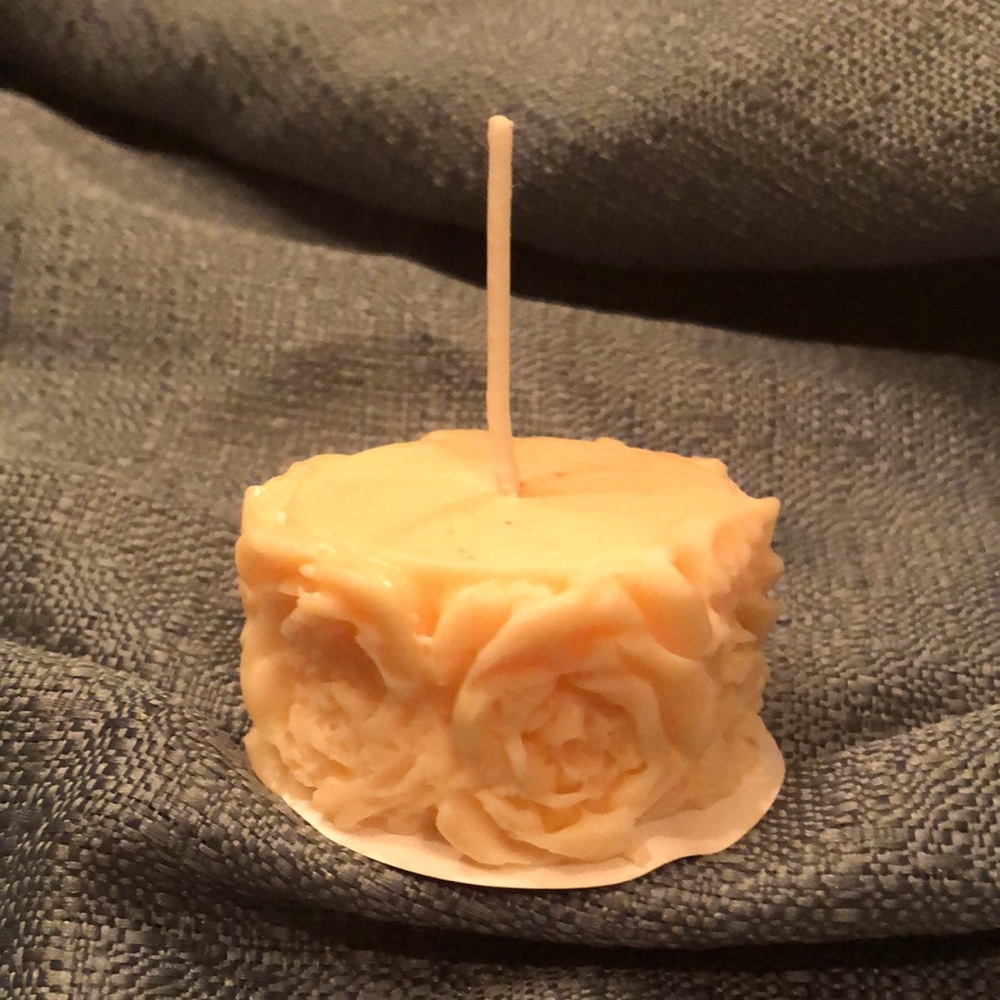 Hand Crafted rose tealight candles. 2 tealight candles for 8 dollars